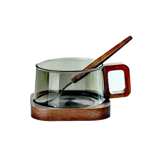 Tasse à café en verre borosilicate foncé avec poignée en bois, cuillère assortie et socle en bois