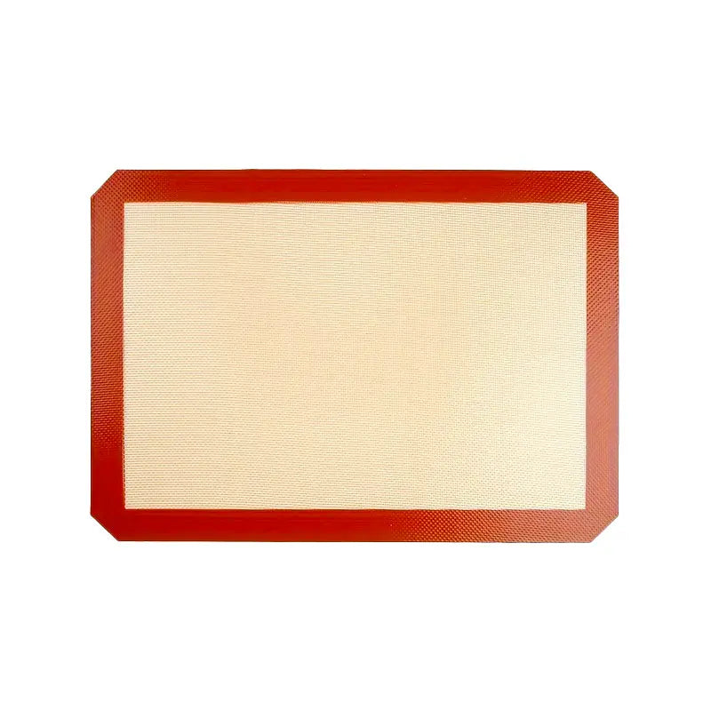 Tapis rectangulaire en silicone avec un cadre rouge, conçu pour un usage antiadhésif et réutilisable au four.