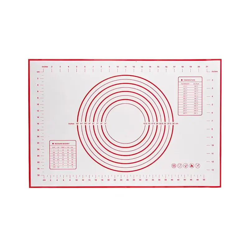 Tapis de pâtisserie rouge en silicone, comportant des mesures en centimètres et pouces, des cercles concentriques pour calibrer la taille des pâtes, et des tableaux de conversion de température et poids.